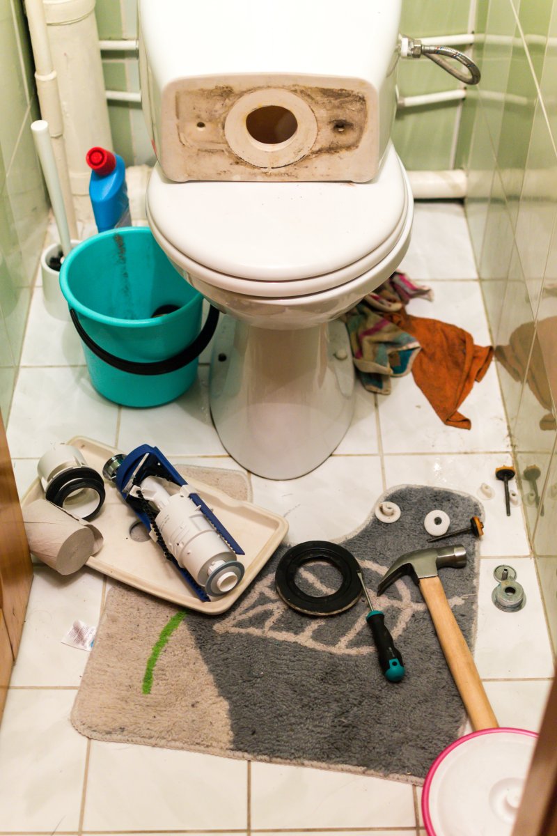 New toilet being installed in a West Horsley bathroom